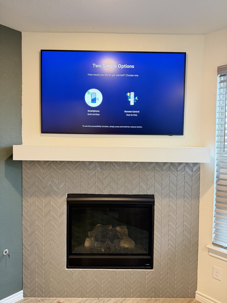 TV mounted above fireplace with concealed wires, Houston TX #2